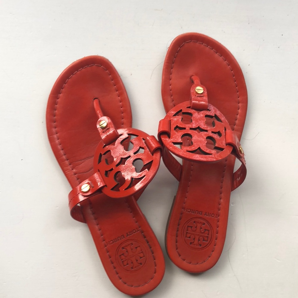 Well loved orange Tory Burch sandals